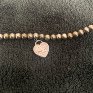 Tiffany & Co. beaded bracelet with heart charm